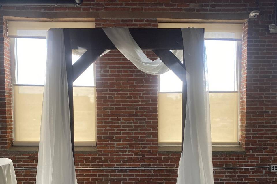 Arch with draping fabric