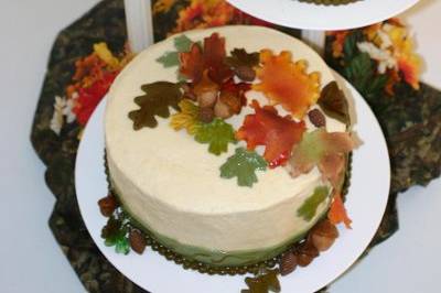 Floating 3 tier Fall cake with gumpaste leaves and fondant ribbons.