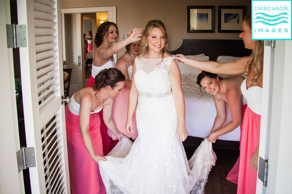 Gorgeous bride is getting ready with besties at  the Pier House Resort and Spa