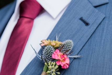 Navy suit with boutonniere
