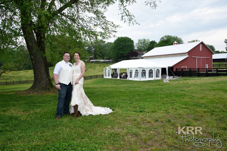 On the farm bride and groom