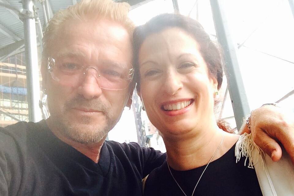 Bono of U2 and Michele Benjamin - wearing Bee Sterling silver necklace New York City