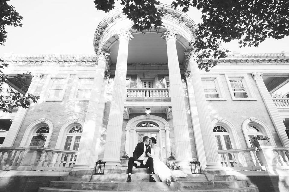 Newlyweds in front of the venue