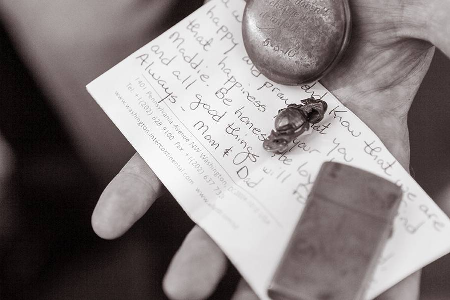 Vows, pocket watch, and vows | Photo courtesy of Michael Benson Photography