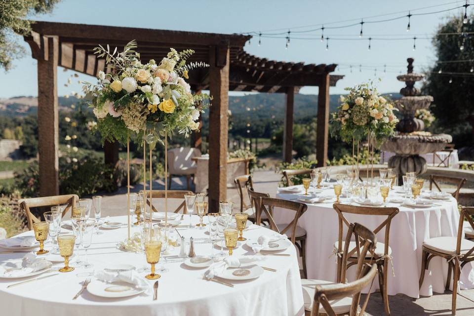 Gold Harlow stand centerpieces
