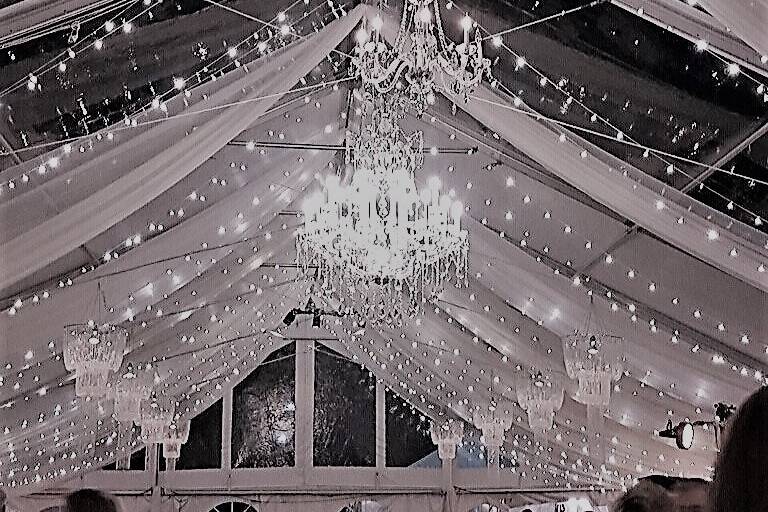 Tent draping with chandeliers