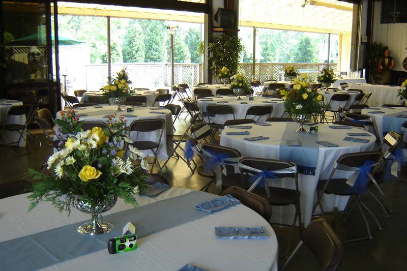 Table setup with floral centerpieces