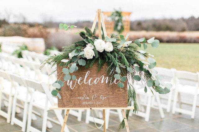 Welcome sign and floral decor