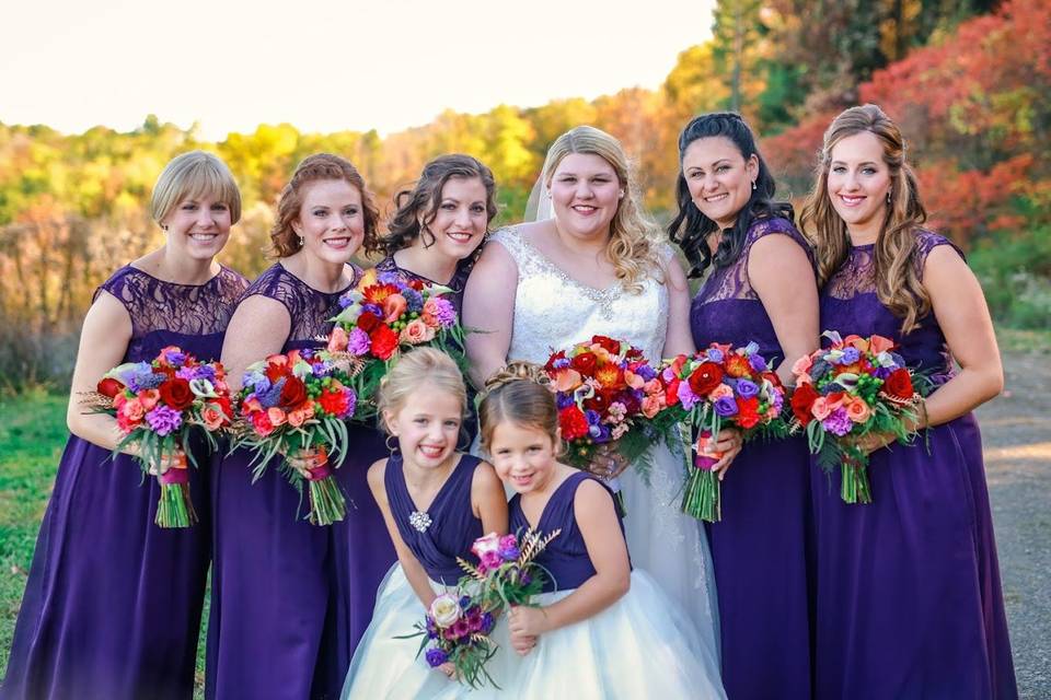 Colorful flowers for the bride, bridesmaids, and flower girls