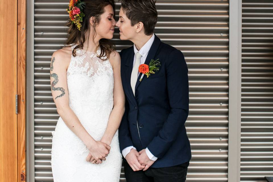 Brides kissing