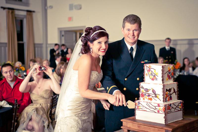 Couple cutting their wedding cake