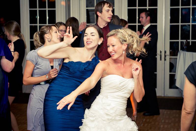 Dancing bride and guests