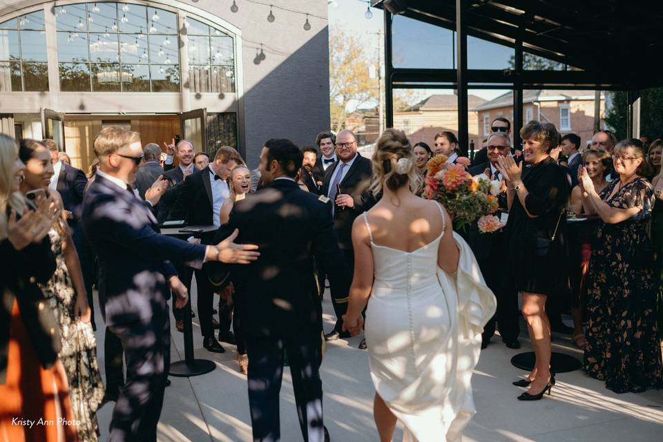 Guests cheer on the terrace