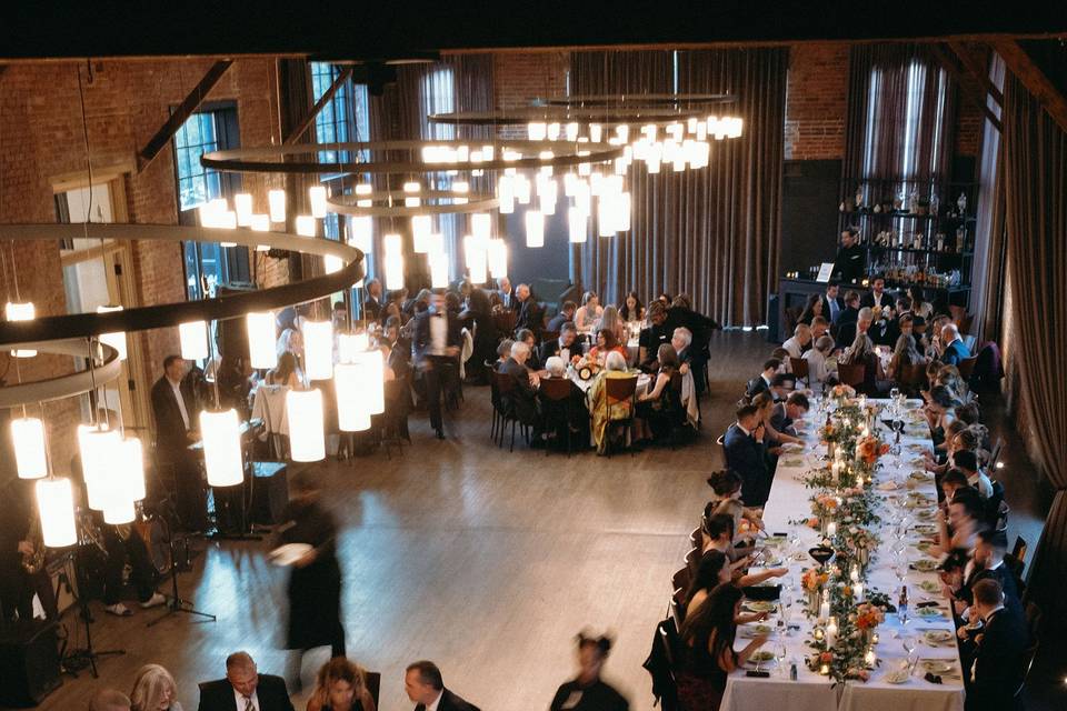 Guests sit and enjoy catering