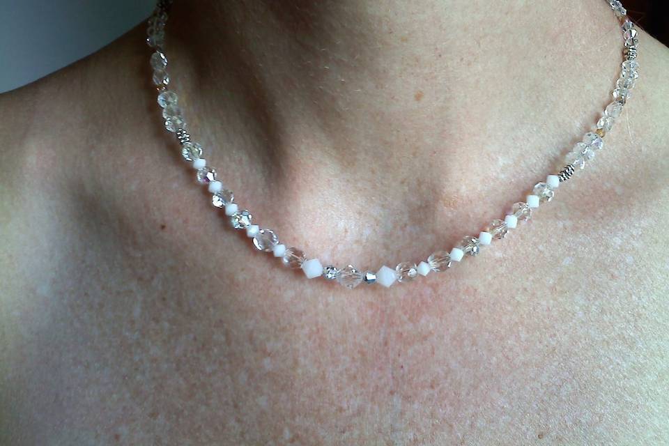 This necklace is made with white swarvski crystals, and clear with some silver spacers.