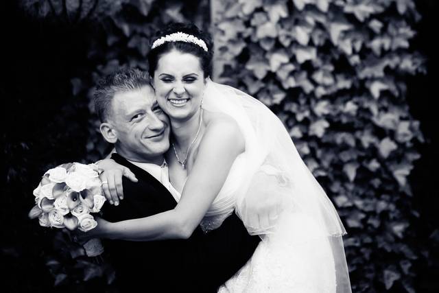 Bride hugging her groom
