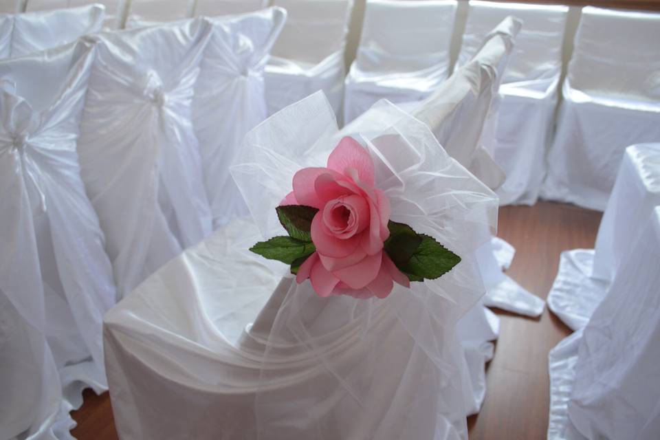 White Satin Ceremony Chair Covers with aisle marker rose bows