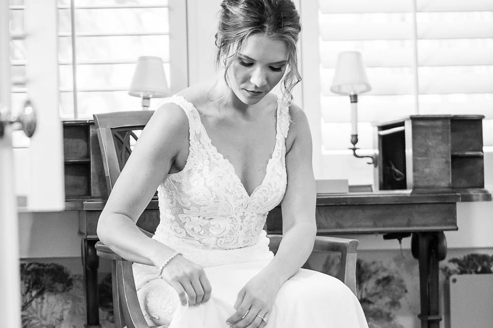 Bride Fixing her Gown Sundy House Wedding