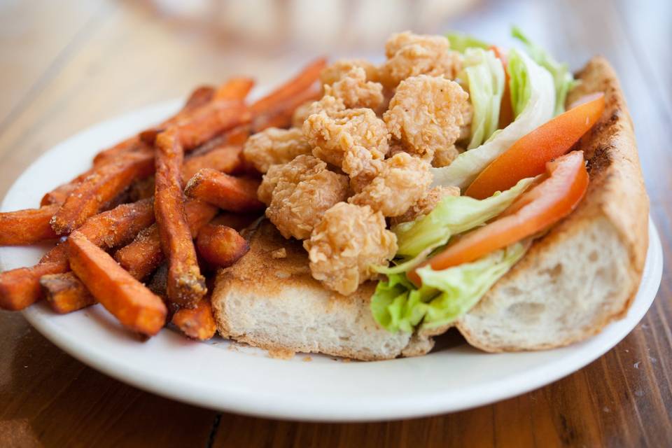 Shrimp poboy and sweet potato fries from our on-site restaurant