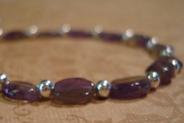 A beautiful and dainty bracelet for your bridesmaids or even the flower girl.
This bracelet is simple and elegant, and looks beautiful individually or stacked as a group or three, or even mixed and matched with my Mother-of-Pearl Bracelet.
* Amethyst
* Silver-plated beads
* Made in Nashville (with Love)
www.etsy.com/shop/jomariejewlry