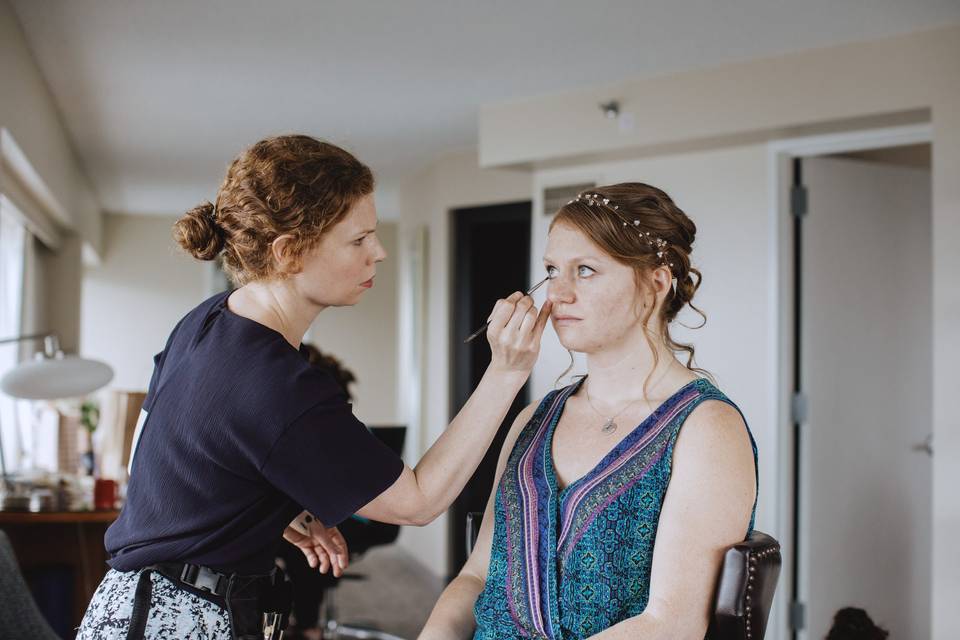 Bride getting her makeup done