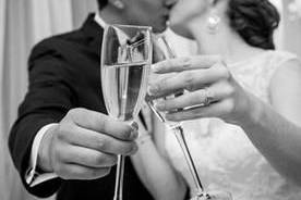 Couple kissing and champagne toast