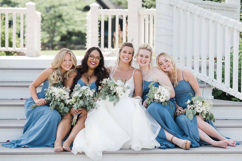 Bride and attendants on steps