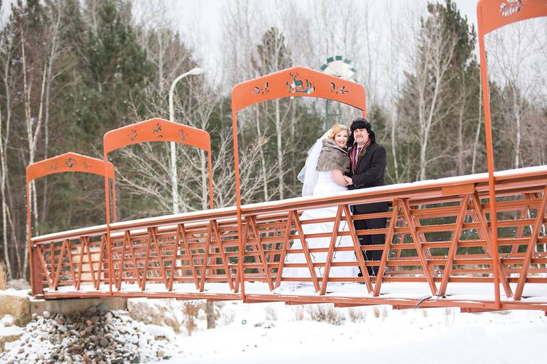 Couple on winter bridge