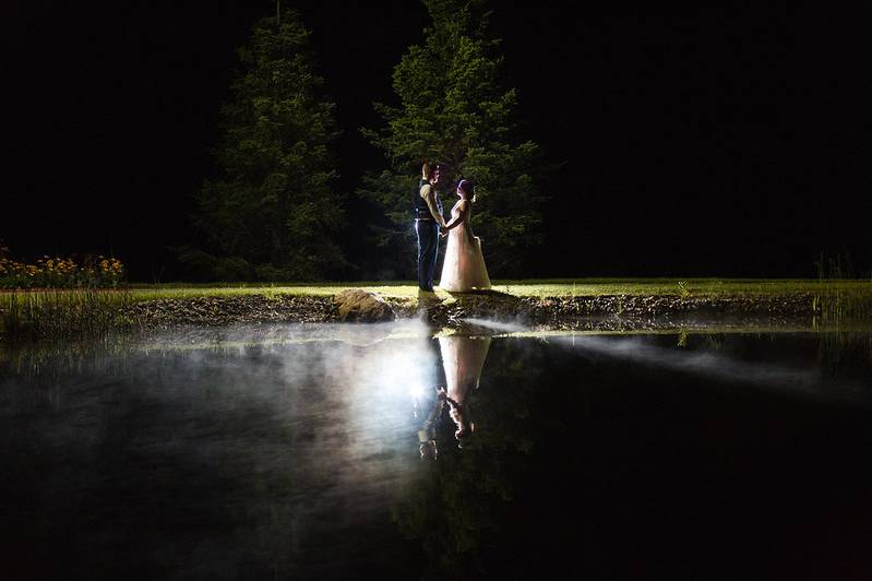 Couple at night by the lake