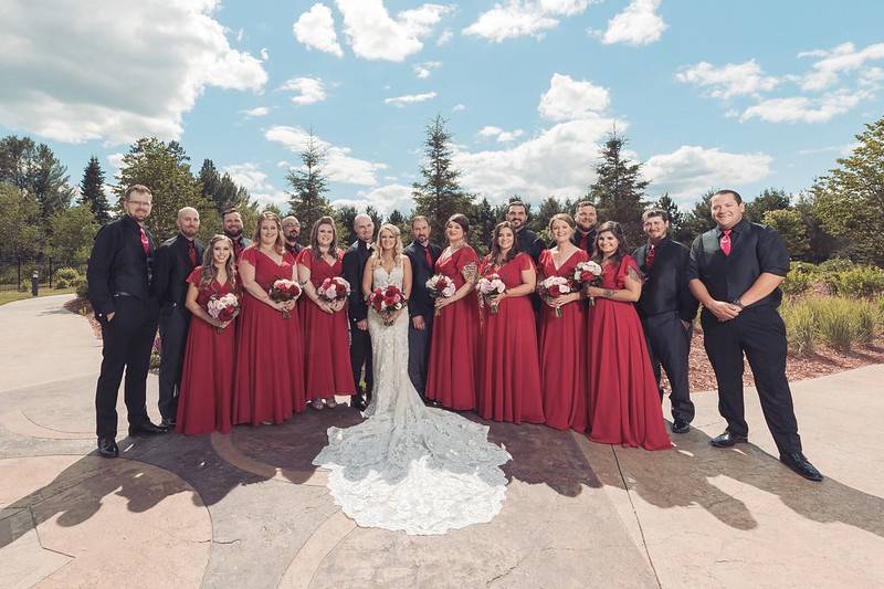 Bridal party in formal gardens