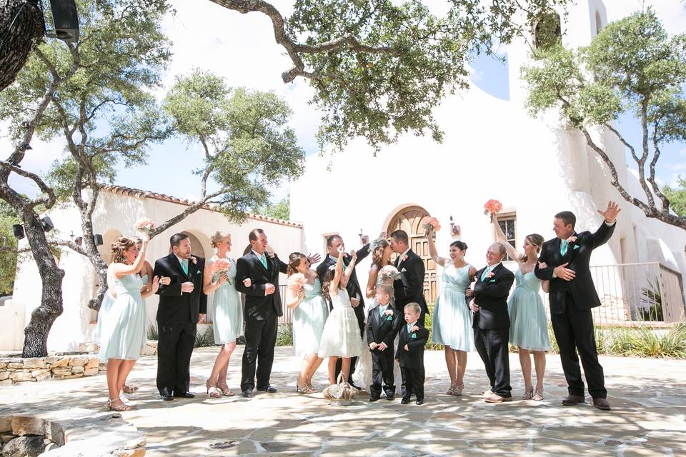 Couple and bridesmaids and groomsmen