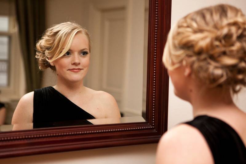 Bride looking in the mirror