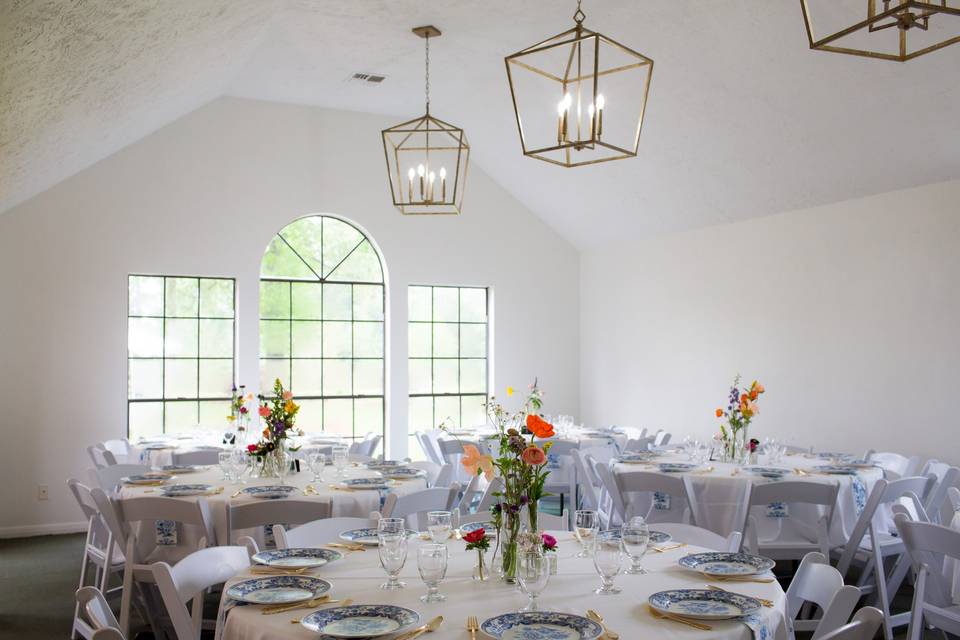 Serenity Rose Farmhouse & Event Space in Conroe, TXDesign: Melanie AbrantesPhoto: Eric Velado Linens & Chairs: EB Inc