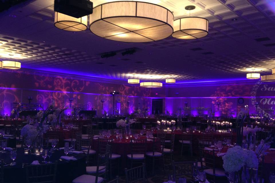 Bolger center - wedding reception with purple uplighting and monograms