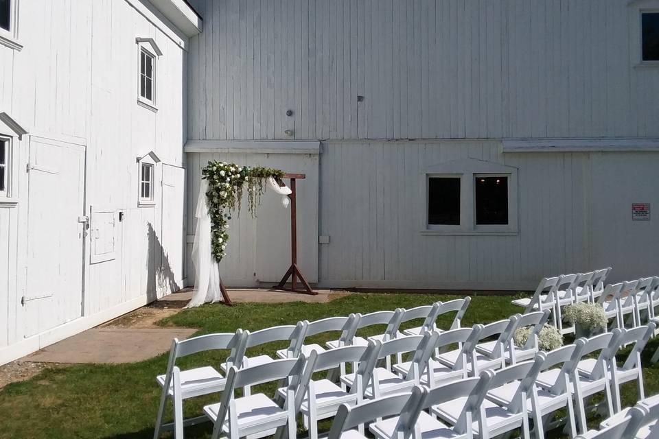 Angled ceremony-rented chairs