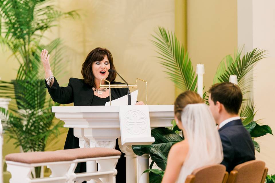 Stella singing at ceremony