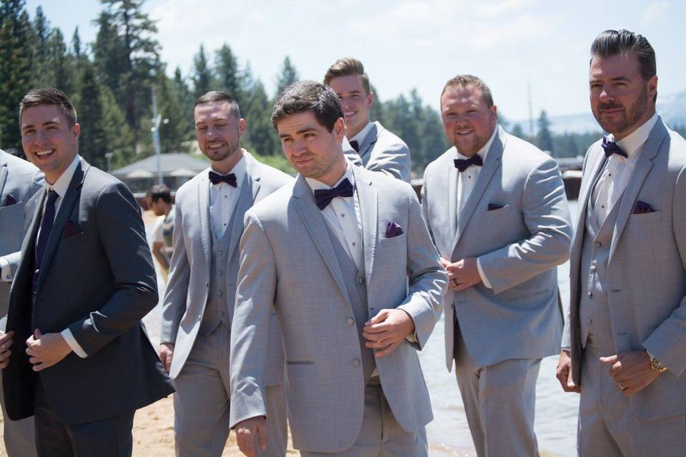 Groomsmen pulling a James Bond at this beach wedding in Lake Tahoe, Nevada