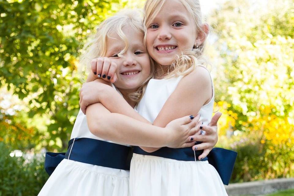 Flower girls and sisters. Undeniable adorable. Children are precious!