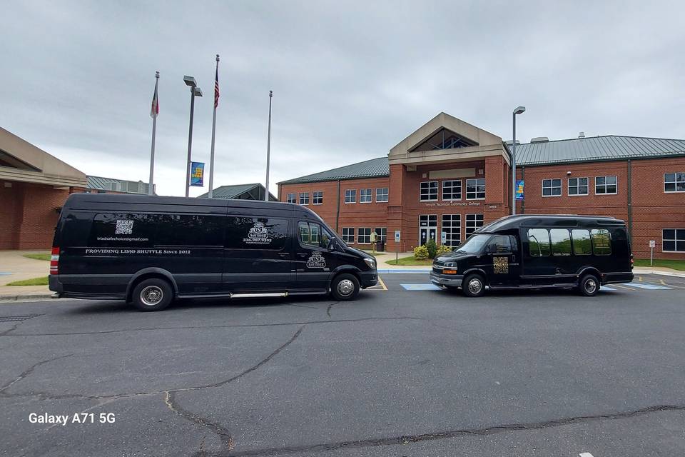 Limo buses in parking lot
