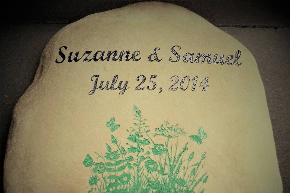 Engraved all natural rocks are permanently sandblasted with your wedding date, name and image of your choice! Color choice is also available.