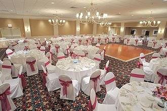 A white & fuschia themed wedding reception in our Crown Ballroom in April 2008.