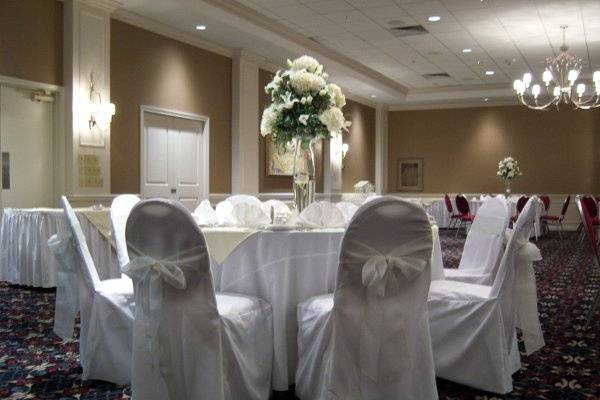 An intimate ivory & white themed wedding for 60 guests in October 2008.