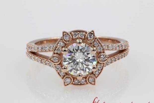 1 Carat Round Diamond Halo Split Shank Rose Gold Engagement Ring. SKU - FDENR9520https://www.fascinatingdiamonds.com/jewelry/round-cut-diamond-halo-ring-with-white-diamond-in-14k-rose-gold/lotus-radiance-halo-ring/1808p1m0s10c