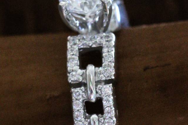 Round Diamond Pave Set White Gold Delicate Engagement Ring.SKU - FDENS3005https://www.fascinatingdiamonds.com/jewelry/round-cut-diamond-side-stone-ring-with-white-diamond-in-14k-white-gold/linked-pave-ring/77p2m701s10c