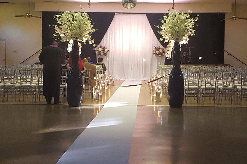 Indoor wedding ceremony setting