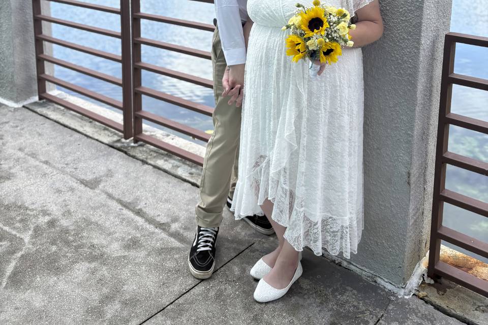 The couple by a waterfront pil