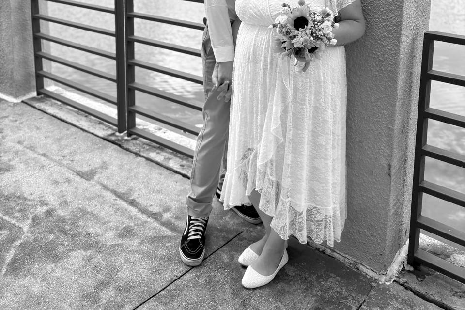 The couple by a waterfront pil