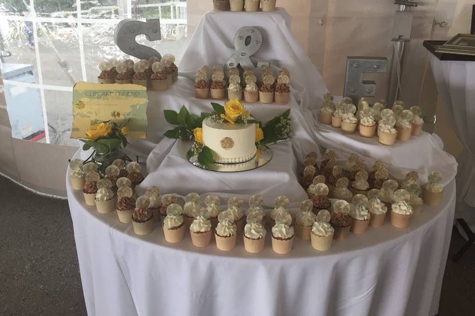 Wedding cake and cupcake station