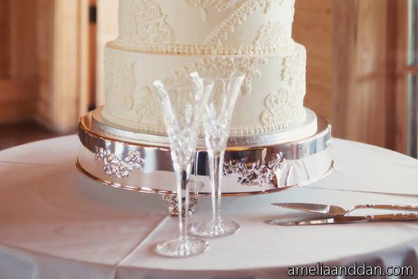 Five tier cake with pink topper