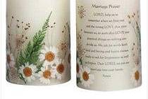 Item 33080-Displaying the Marriage Prayer, this candle features pressed daisies and baby's breath. Vanilla scent. 3 1/2